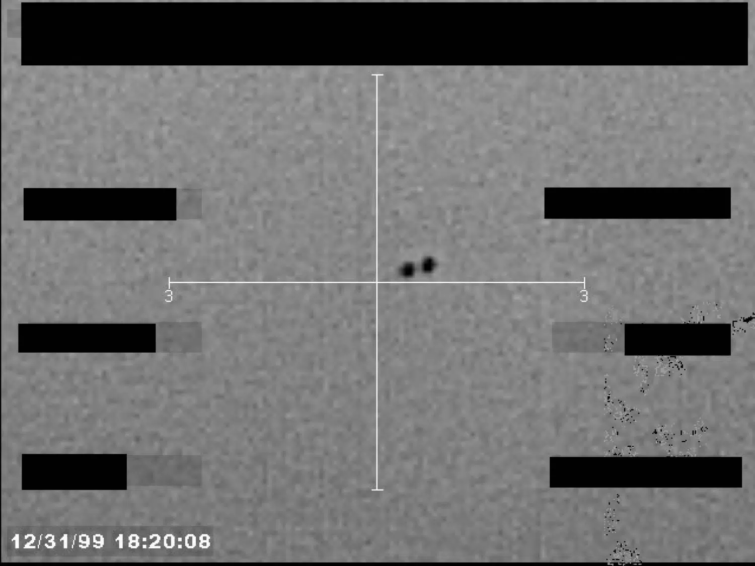 FBI UAP image: two circular features and image distortion (B014) — opening source page