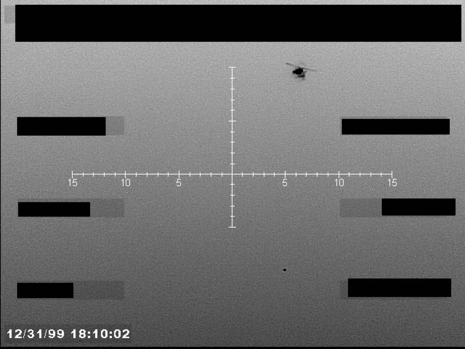 FBI UAP image: helicopter-like feature and smaller object (B007) — opening source page