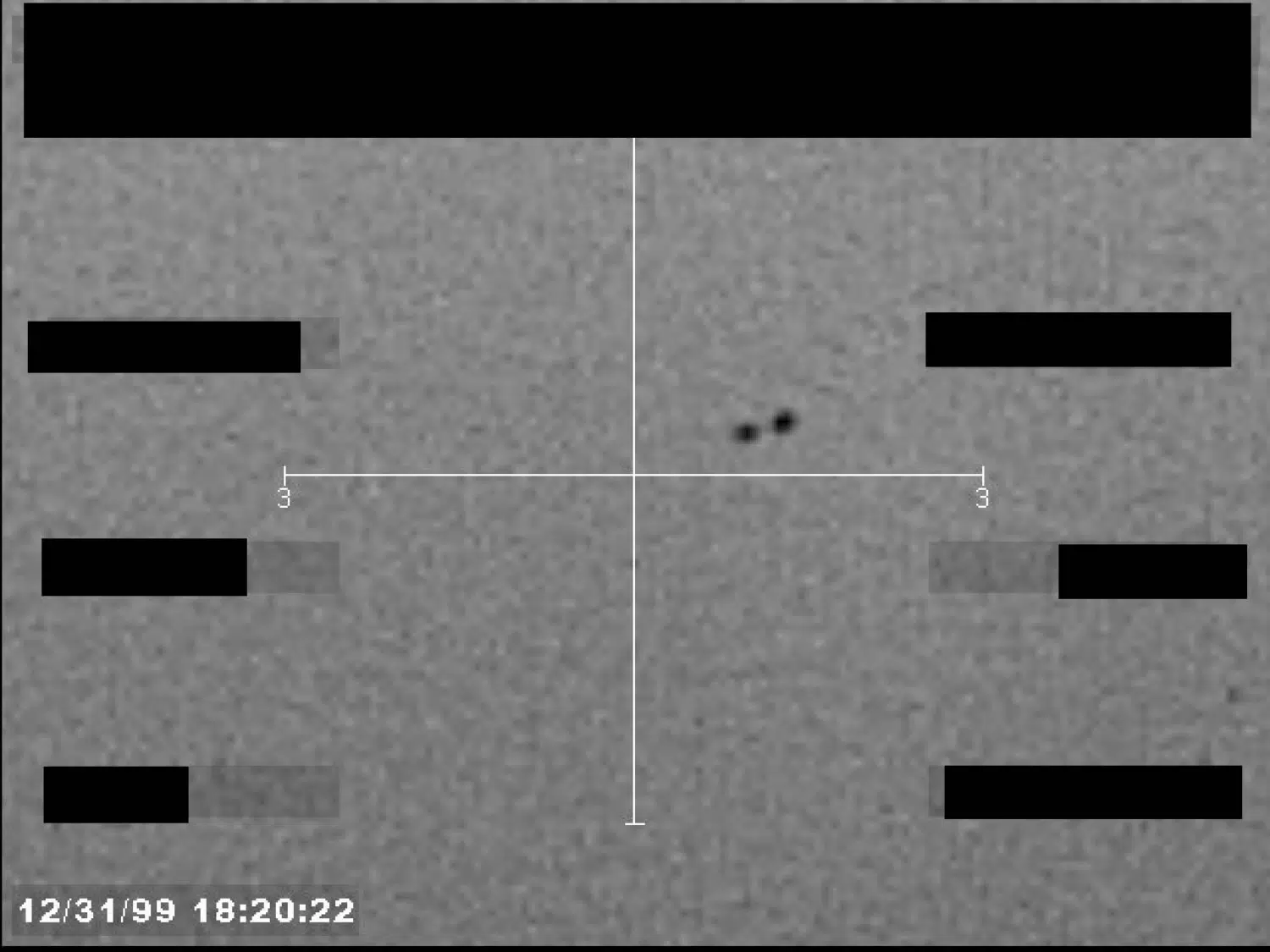 FBI UAP image: two circular features (B015) — opening source page