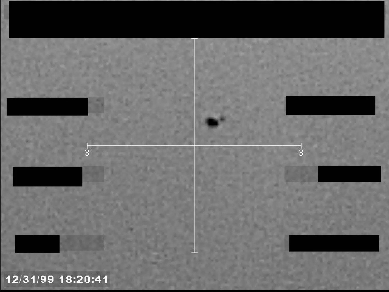 FBI UAP image: two irregular features (B016) — opening source page